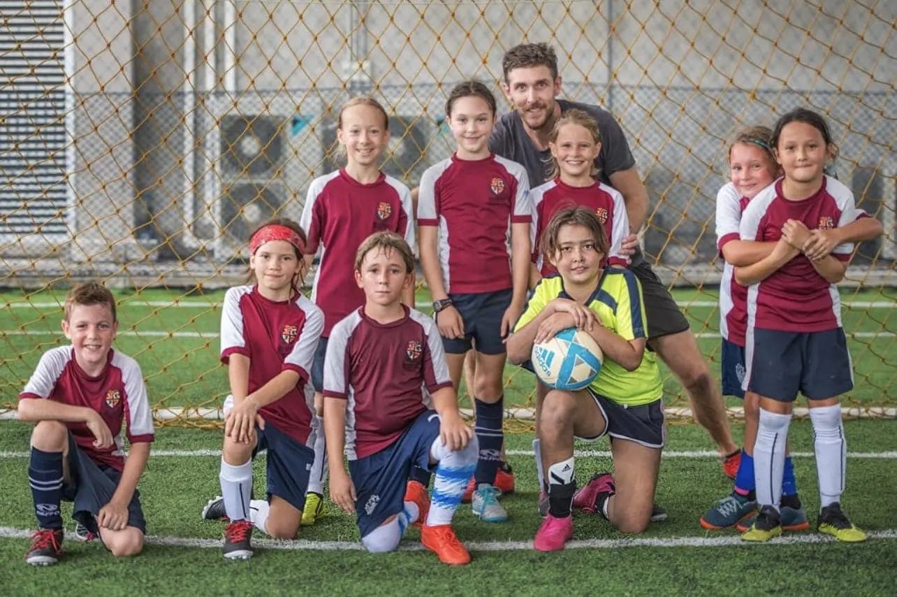 The club’s first group with their coach, in the maroon and white kit of its early years