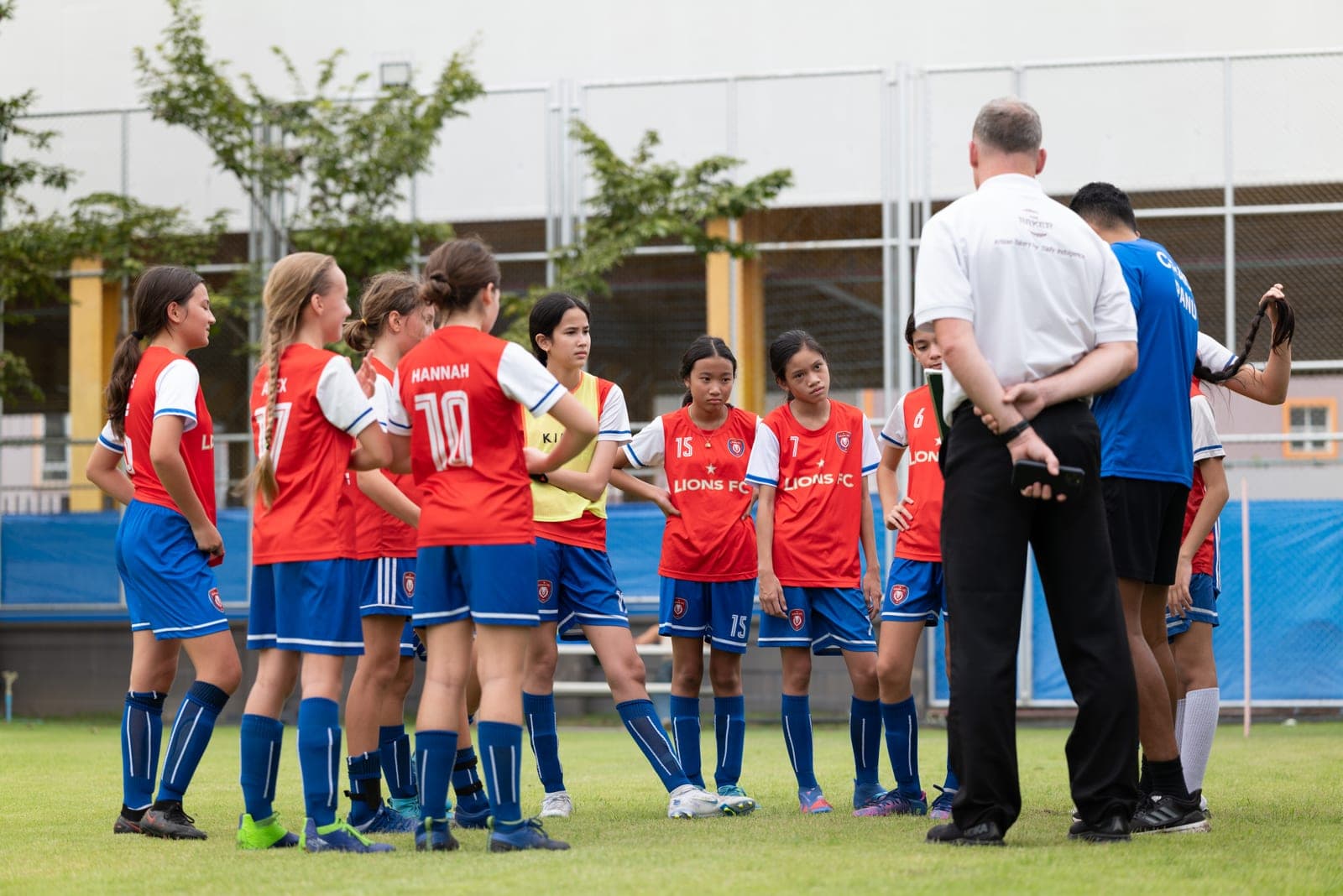 The team together with the match officials before kick-off