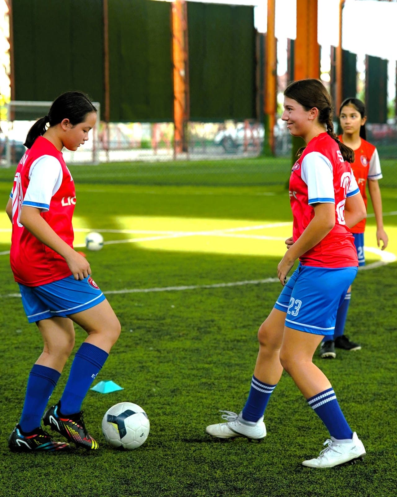 Two players working on close control during a training session