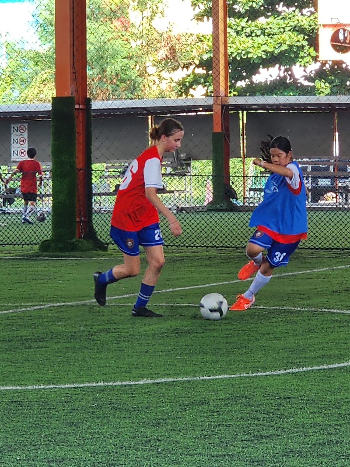 Two players working on the ball during training
