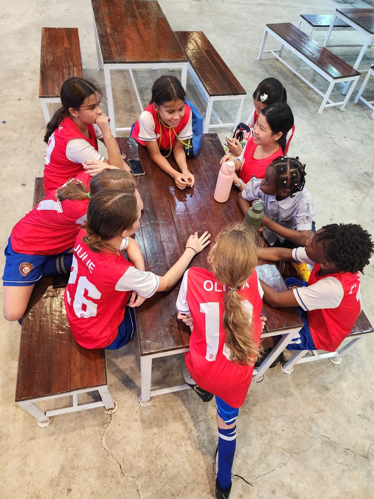 Players sitting together at a table